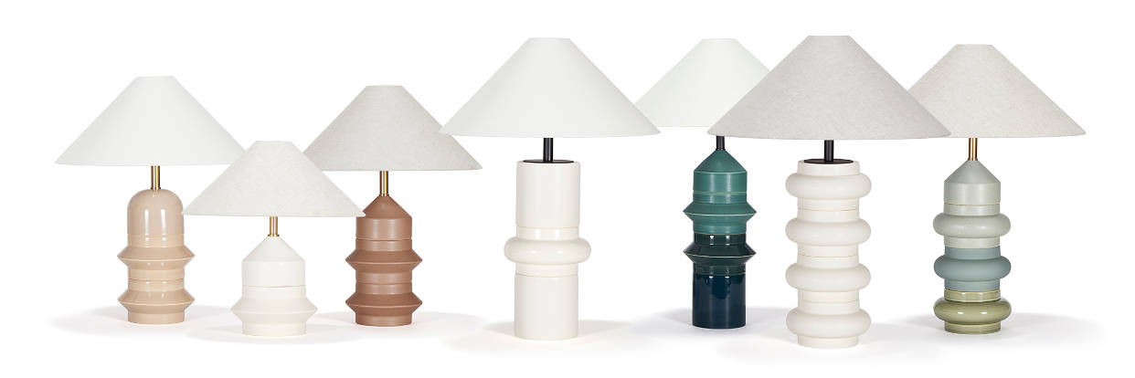 Seven Carn modular lamps in various styles and colors