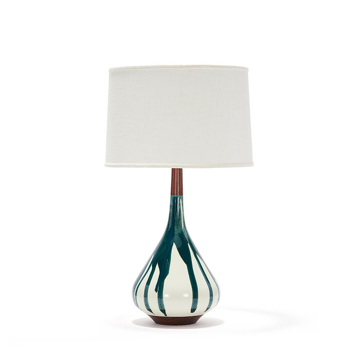 miller in custom dark teal drape